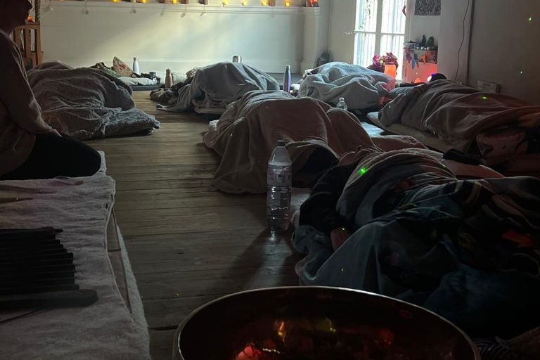 Photo of people attending a breath and sound circle Breathwork and Soundbath Circle